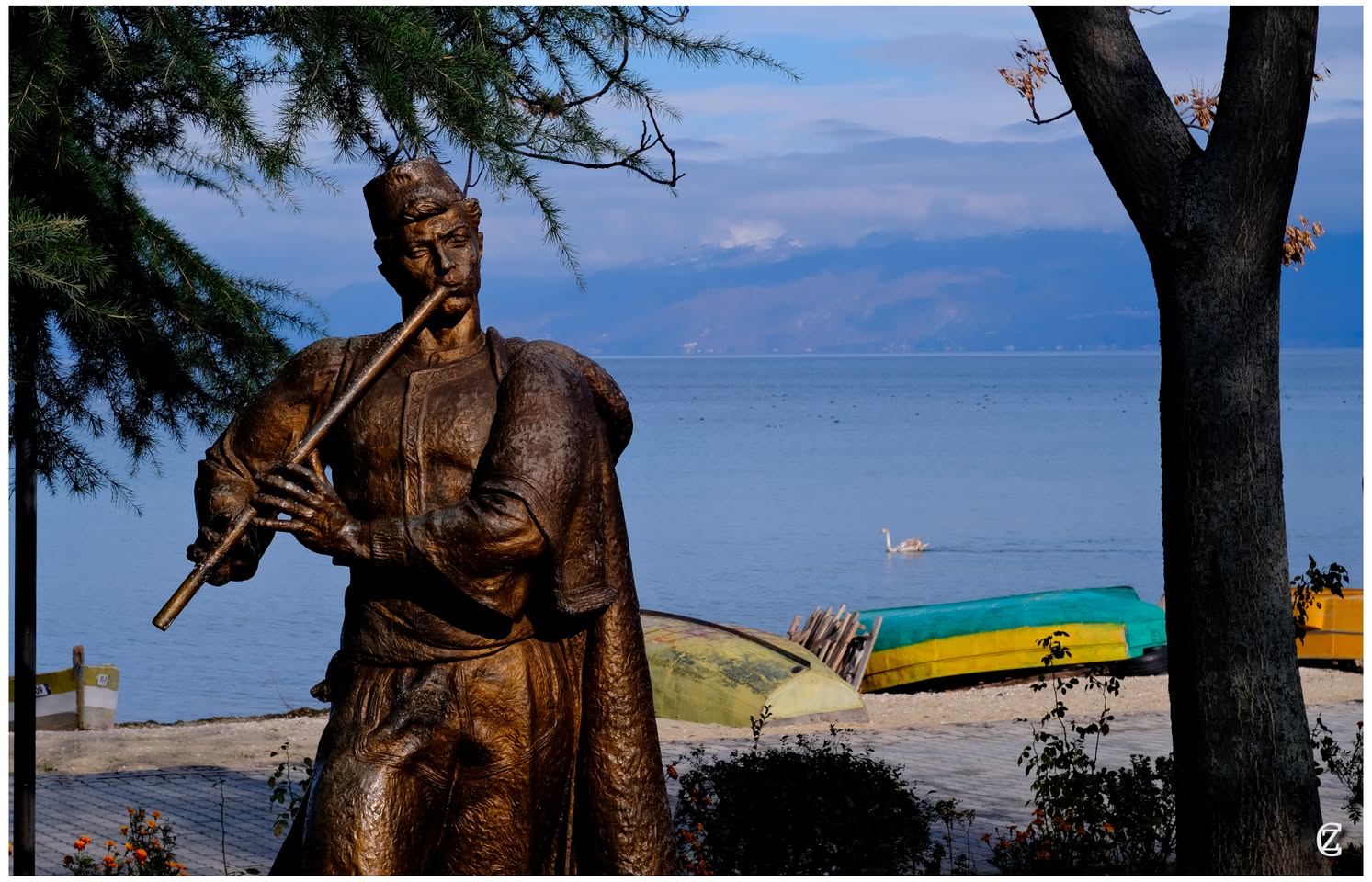The flute player statue on the Pogradec promenade